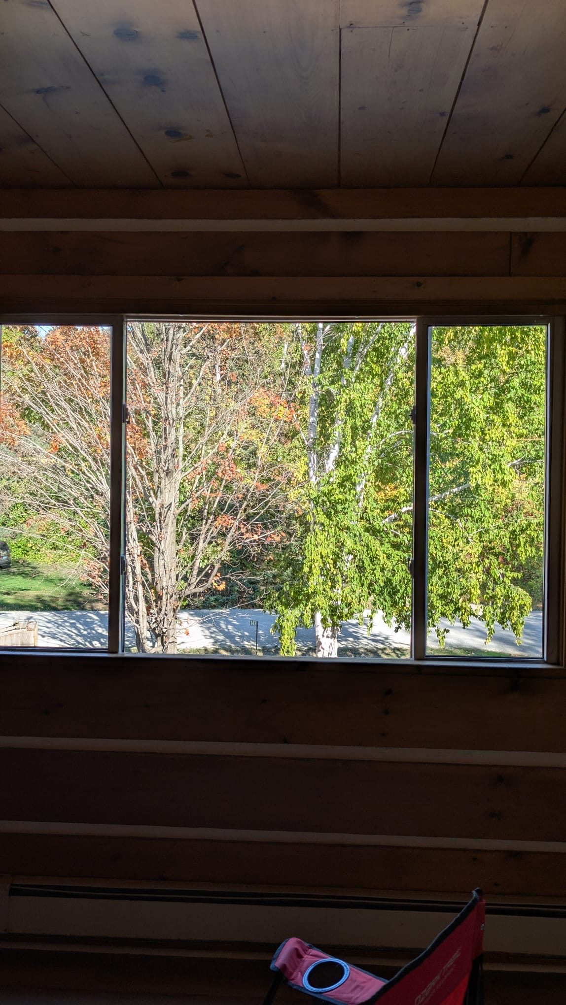 Ontario Window Cleaning crew cleaning windows at a Burlington home — streak-free, purified-water system.